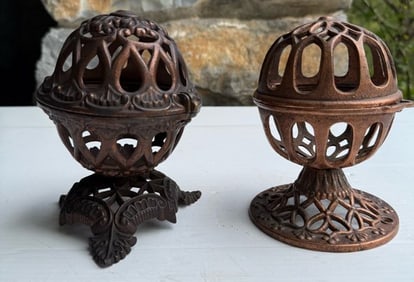(2) CAST IRON STRING HOLDERS