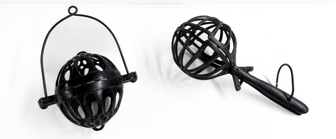 (2) CAST IRON STRING HOLDERS