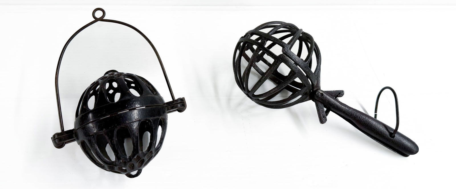 (2) CAST IRON STRING HOLDERS (1 of 4)