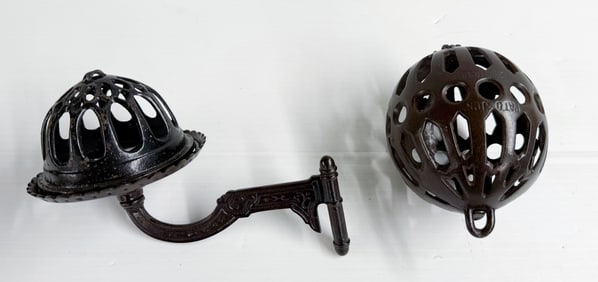 (2) CAST IRON STRING HOLDERS