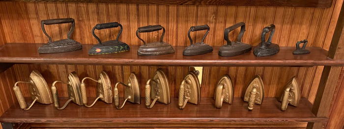 LOT OF ANTIQUE SAD AND FLAT IRONS