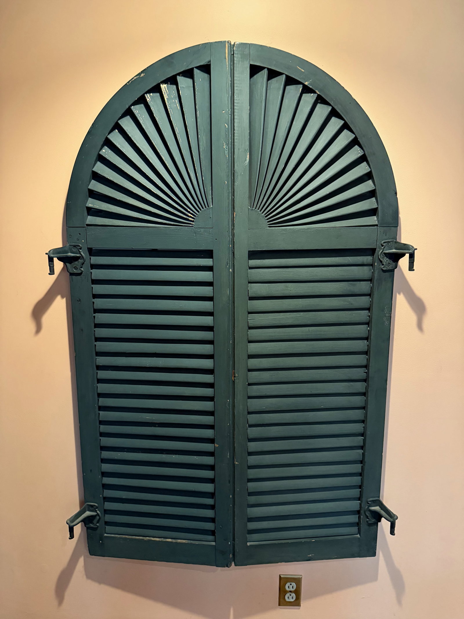 (2) PAIRS OF PAINTED SHUTTERS: DARK GREEN PAINT WITH HORIZONTAL AND FAN LOUVRES. 54 1/2" X 34" PER PAIR. CONDITION REPORTS ARE BASED ON VISUAL INSPECTION. IF YOU HAVE ANY FURTHER QUESTIONS REGARDING CONDITION OF AN ITEM, PLEASE CON