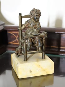 CAST IRON CHILD IN HIGHCHAIR