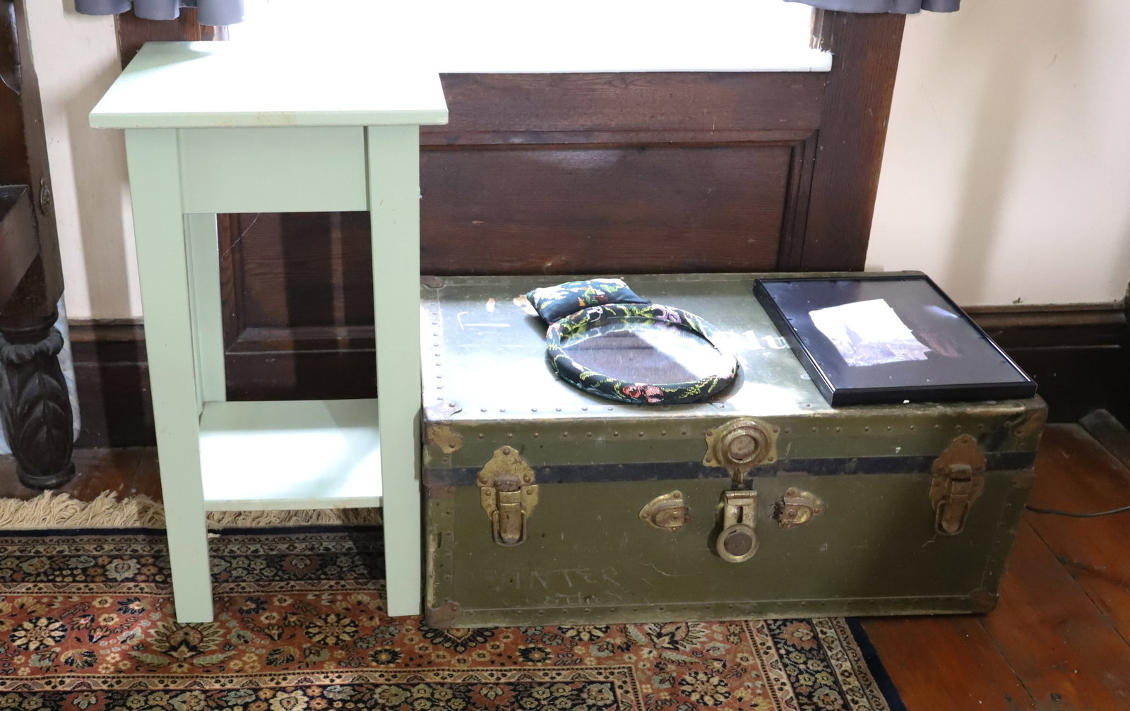 PAINTED STAND, TRUNK, MIRROR AND MORE: STAND 27" X 15" X 15". GREEN TRUNK 30 3/4". TEXTILE MIRROR AND FRAMED PHOTOGRAPH. PLEASE READ CAREFULLY - THIS IS AN ONLINE ONLY AUCTION - Terms for Purchasing and Shipping of Auction Items. Please re