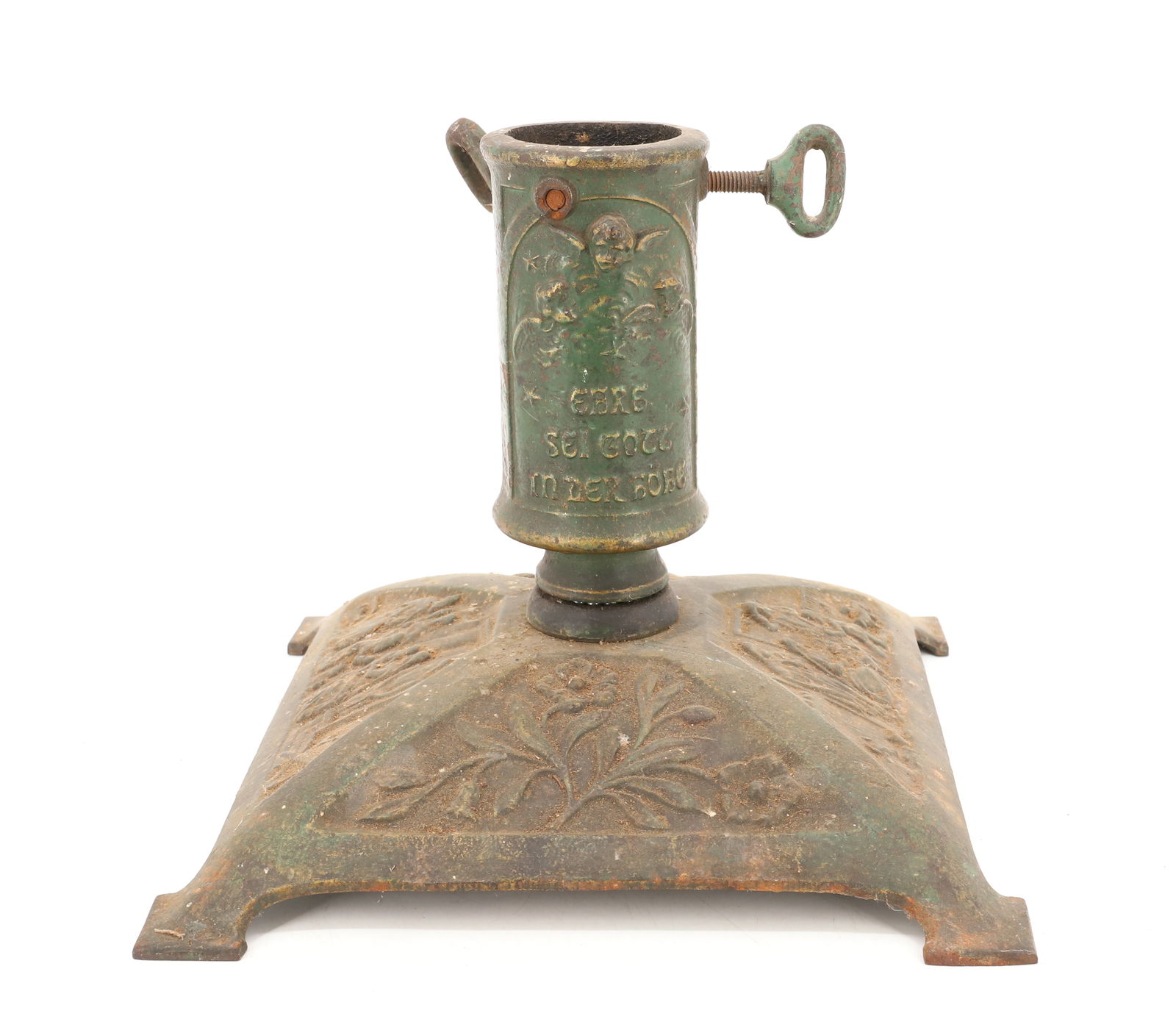 CAST IRON CHRISTMAS TREE STAND: PAINTED CAST IRON STAND WITH GERMAN VERSE AND EMBOSSED DECORATION. 9 1/4" X 11" X 11". PLEASE READ CAREFULLY - Terms for Purchasing and Shipping of Auction Items. Please read carefully before bidding.