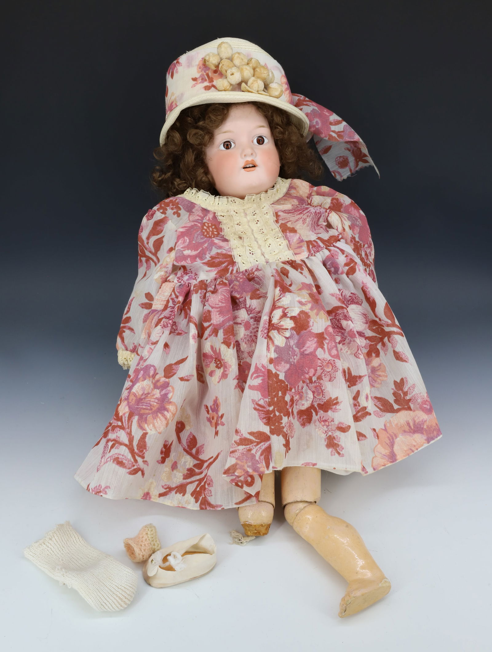 ARMAND MARSEILLE BISQUE DOLL: HANDPAINTED BISQUE HEAD WITH BROWN GLASS EYES, OPEN MOUTH W/ TEETH . MRKD. "ARMAND MARSEILLE, GERMANY 390, A.G.M." JOINTED COMPOSITION BODY. 22" H. PLEASE READ CAREFULLY - Terms for Purchasing and Shi