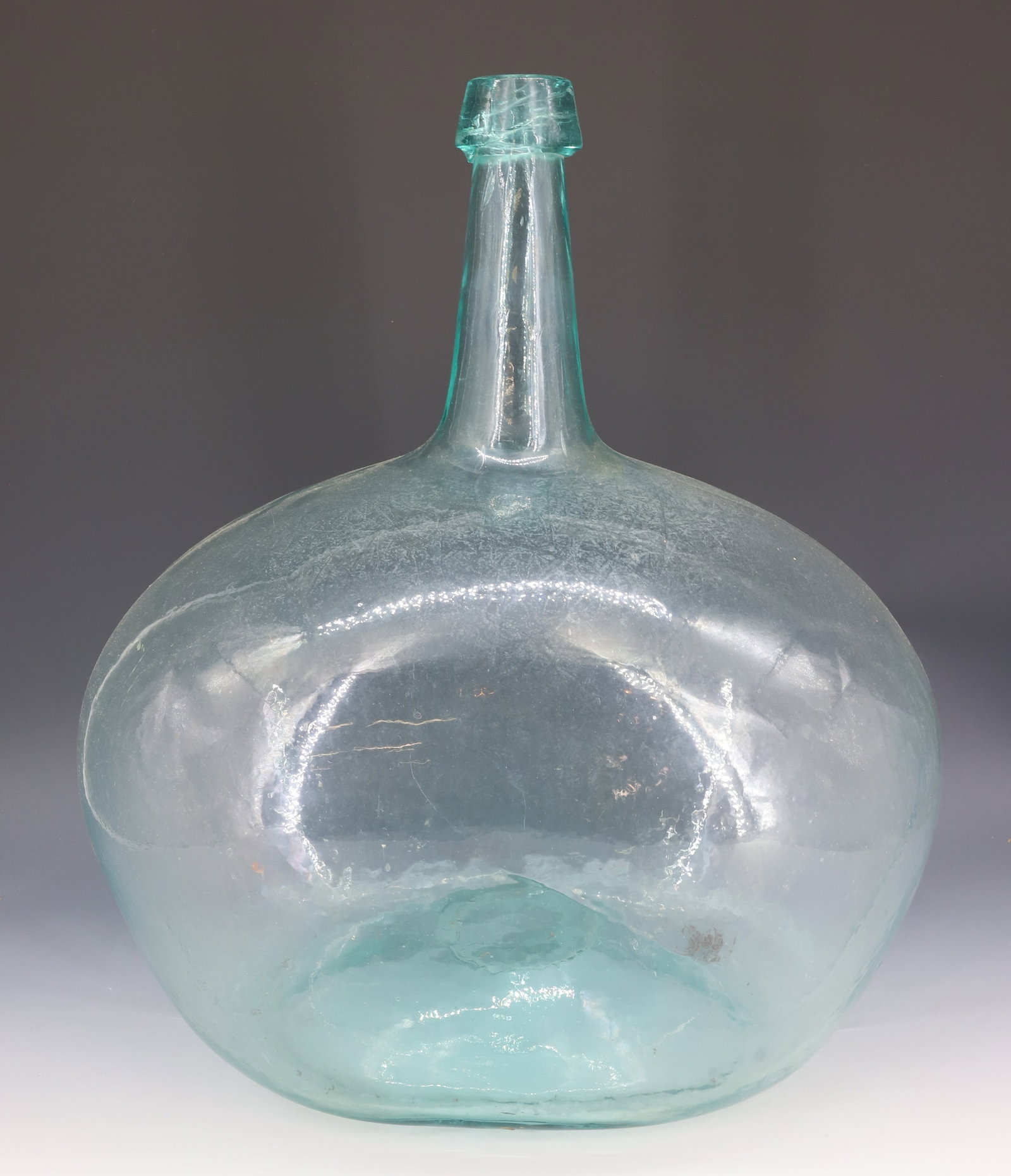 ANTIQUE GLASS CARBOY, BOTTLE: AQUA BOTTLE WITH APPLIED TOP. OPEN PONTIL. 18 1/2" H. PLEASE READ CAREFULLY - Terms for Purchasing and Shipping of Auction Items. Please read carefully before bidding. Hartzell?s Auction Gallery. Hart