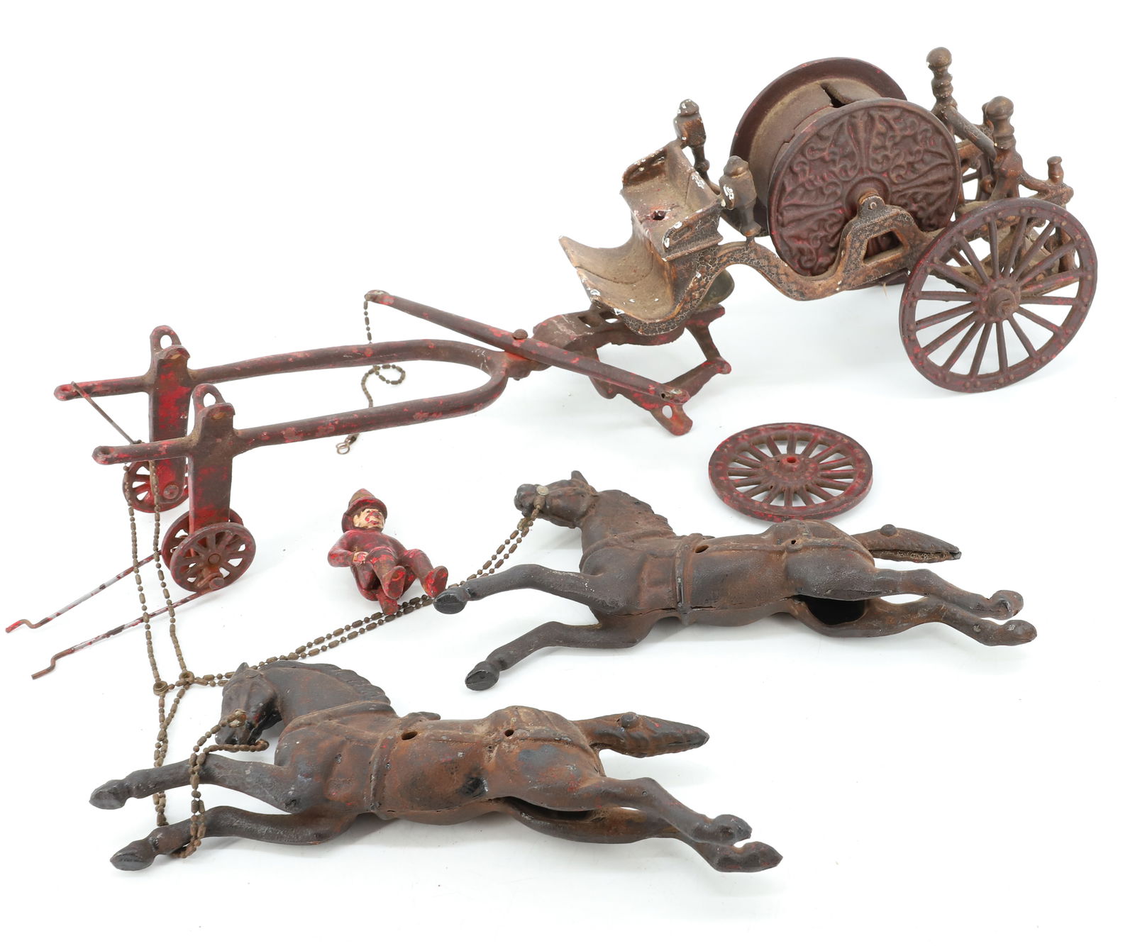 ANTIQUE CAST IRON FIRE PUMPER: PAINTED CAST IRON HORSE DRAWN FIRE PUMPER. 19" L. PLEASE READ CAREFULLY - Terms for Purchasing and Shipping of Auction Items. Please read carefully before bidding. Hartzell?s Auction Gallery. Hartzell