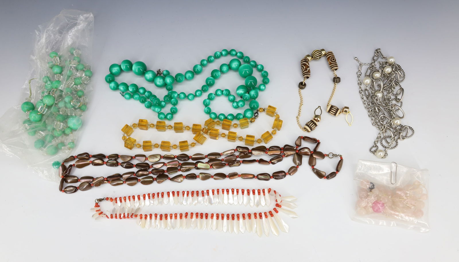 COSTUME JEWELRY LOT: (6) NECKLACES INCLUDING SQUARE CUT GLASS AMBER CZECH BEADS ALSO BAG OF LOOSE CZECH BEADS 16" TO 36" PLEASE READ CAREFULLY - Terms for Purchasing and Shipping of Auction Items. Please read carefully be