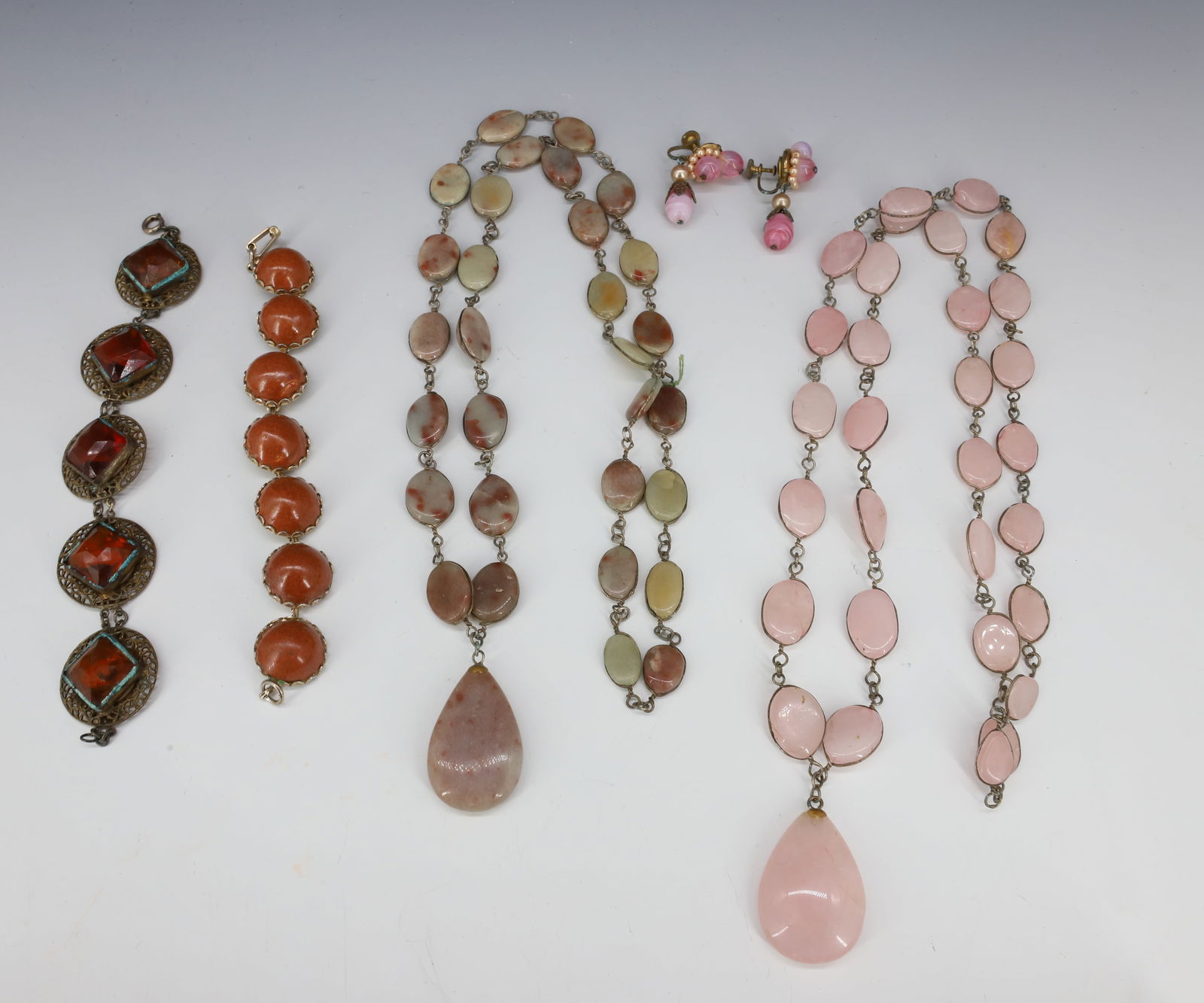 COSTUME JEWELRY LOT: QUARTZ AND JADEITE NECKLACES RHINESTONE BRACELET 30" 6 1/2" PLEASE READ CAREFULLY - Terms for Purchasing and Shipping of Auction Items. Please read carefully before bidding. Hartzell?s Auction Gallery