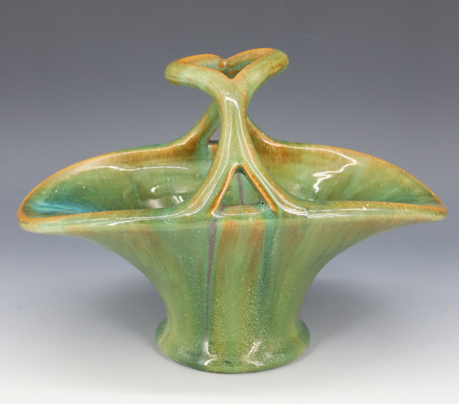 FULPER POTTERY BASKET: FLAMBE GLAZE. IMPRESSED ON BOTTOM. 9 1/4" L. PLEASE READ CAREFULLY - Terms for Purchasing and Shipping of Auction Items. Please read carefully before bidding. Hartzell?s Auction Gallery. Hartzell's Au