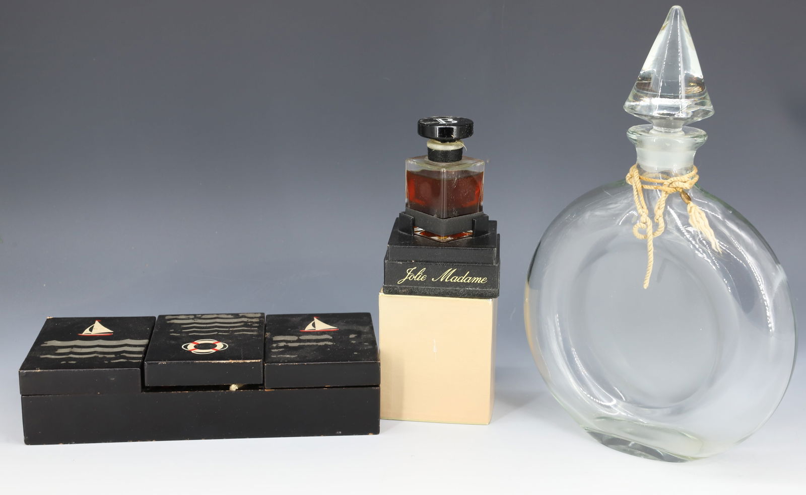 VINTAGE PERFUME, CUFFLINKS AND NECKLACE: PIERRE BALMAIN, PARIS PERFUME IN BOX, LARGE CLEAR GLASS GUERLAIN PERFUME BOTTLE 9 1/2" H. WITH, ASSORTMENT OF CUFFLINKS, COIN NECKLACE IN SAILBOAT MOTIF BOX. PLEASE READ CAREFULLY - Terms for Purchasi