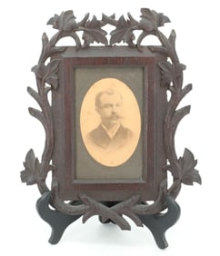 CARVED WOODEN FRAME
