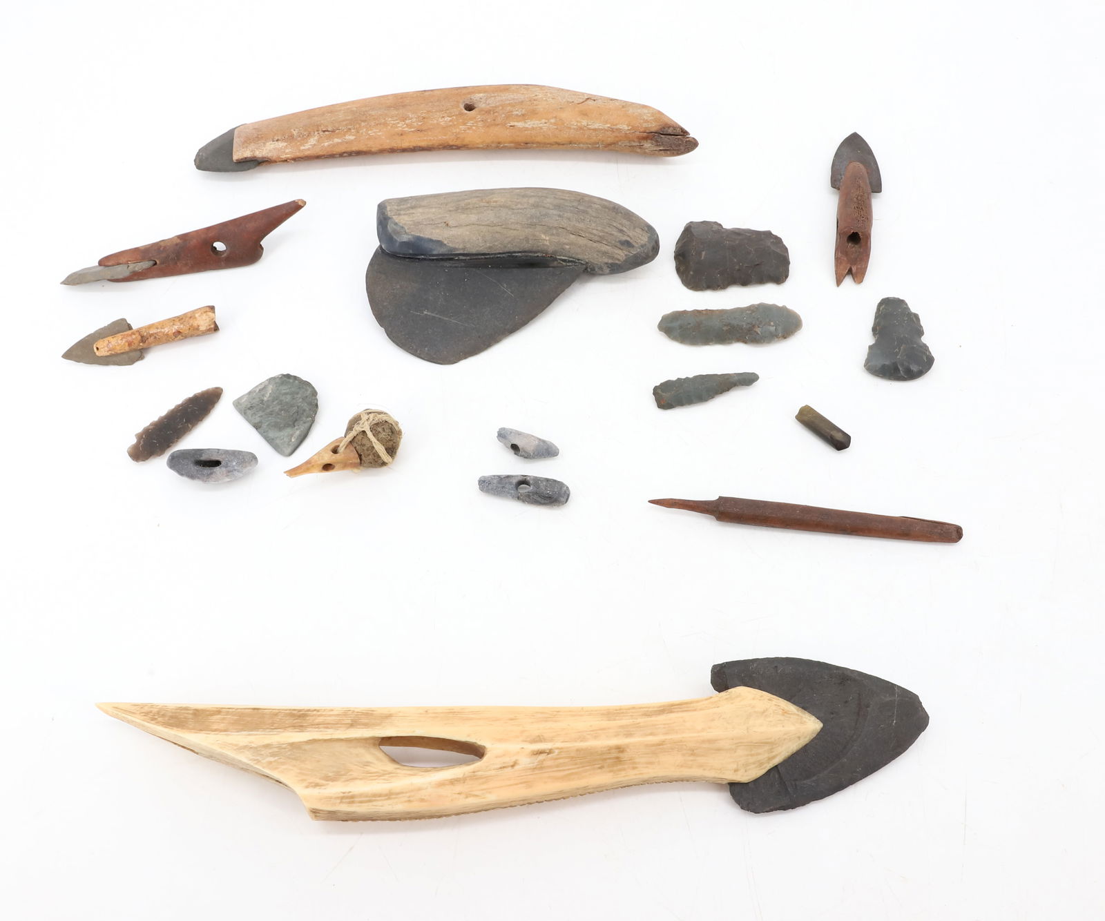 LOT OF STONE ARTIFACTS: POINTS AND TOOLS. SOME WITH BONE / ANTLER ATTACHMENTS. LARGEST 11" TOTAL LENGTH. PLEASE READ CAREFULLY - Terms for Purchasing and Shipping of Auction Items. Please read carefully before bidding. Hartz