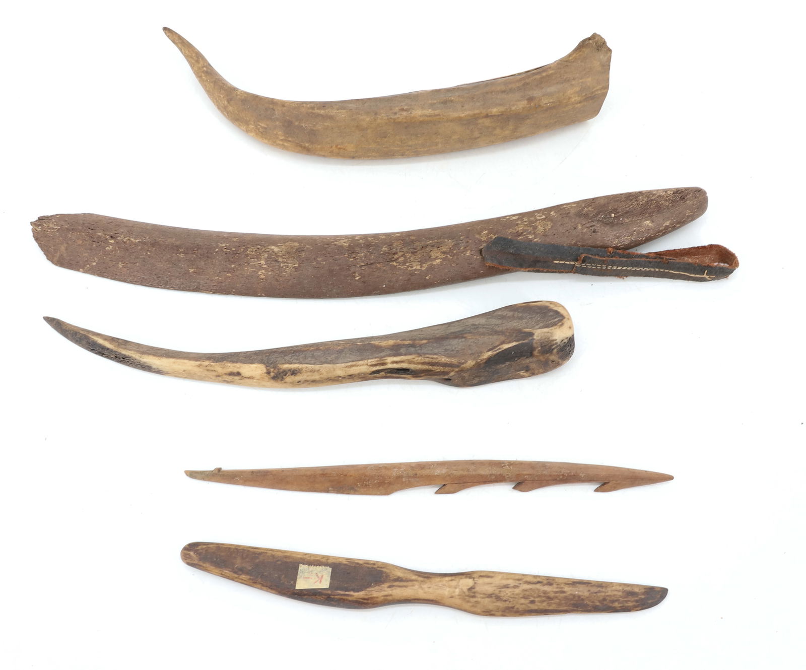 LOT OF EARLY TOOLS: ANTLER AND BONE TOOLS. LARGEST IS MRKD. "WHALE RIB" 13 1/2" L. PLEASE READ CAREFULLY - Terms for Purchasing and Shipping of Auction Items. Please read carefully before bidding. Hartzell?s Auction Gall