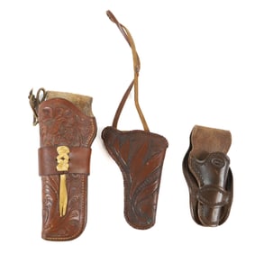 (3) HAND TOOLED LEATHER HOLSTERS