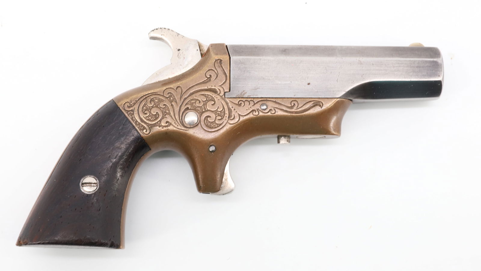 MERRIMACK ARMS COMPANY DERRINGER: 41 CAL, SERIAL# 401, BRASS FRAME ENGRAVED - 2 1/2" OCTAGONAL BARREL ANTIQUE OR BLACK POWDER, NO REGISTRATION OR TRANSFER REQUIRED PLEASE READ CAREFULLY BEFORE BIDDING. ALL PAYMENTS MUST BE MADE BEFORE