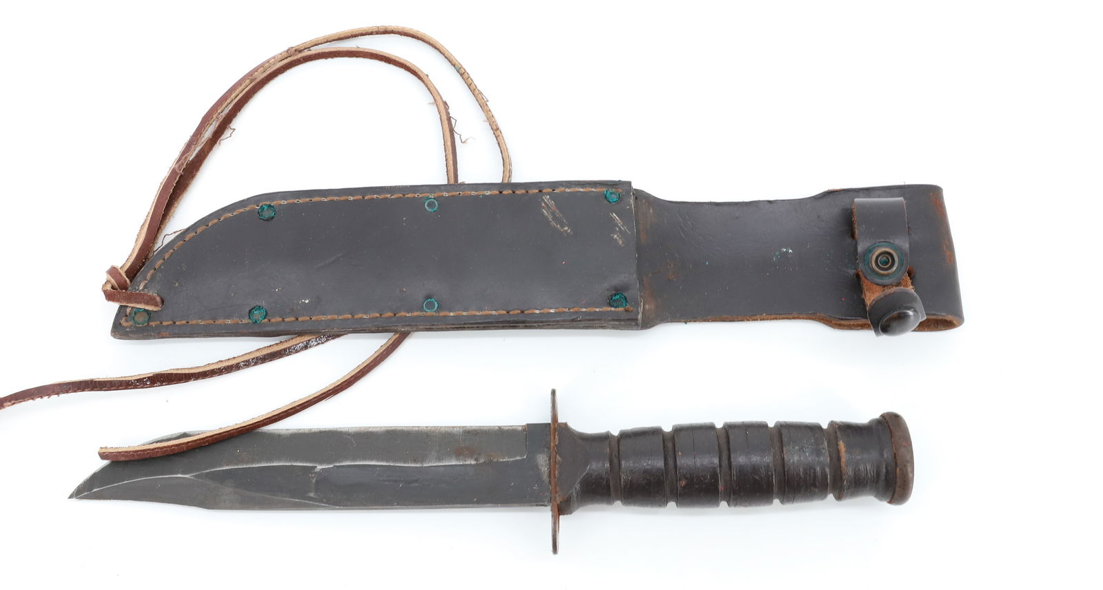U.S. CAMILLUS, NEW YORK KNIFE: WITH LEATHER SHEATH, 7" BLADE - 12 1/2" TOTAL PLEASE READ CAREFULLY BEFORE BIDDING. ALL PAYMENTS MUST BE MADE BEFORE ITEMS CAN BE SHIPPED. BUYERS CAN PAY VIA LIVE AUCTIONEERS PAYMENT CENTER IF HAVING