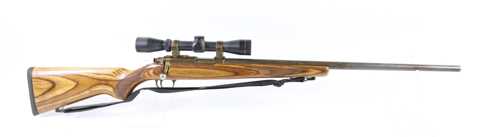 RUGER M77/22 BOLT ACTION RIFLE: 22 LR, SERIAL# 703-68410, WITH LEUPOLD 2X7 SCOPE - THIS GUN REQUIRES A BACKGROUND CHECK, FEDERAL FIREARMS LICENSE. OR TRANSFER TO AN FFL HOLDERPLEASE READ CAREFULLY BEFORE BIDDING. ALL PAYMENTS MUST B