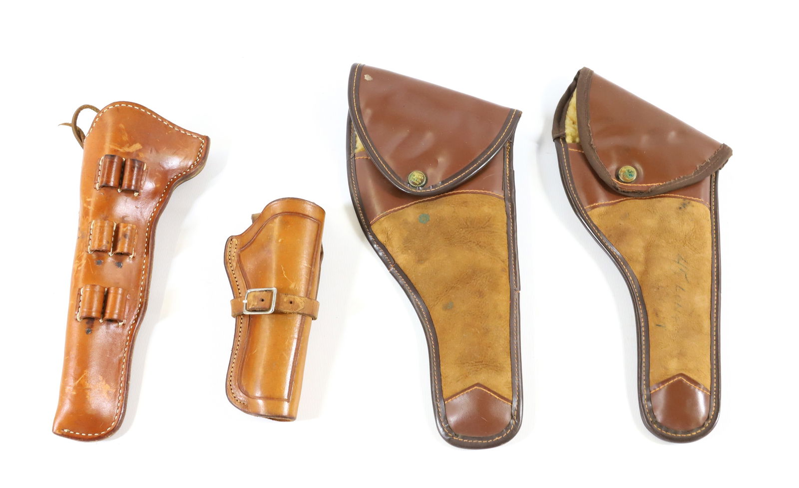 LOT OF (4) LEATHER HOLSTERS: INCLUDING: COLT, EL PASO SADDLERY COMPANY AND TWO BRAUER BROS. ST. LOUIS SIDE HOLSTERS. 7" TO 14" LENGTHS. - PICK-UP FOR THIS AUCTION WILL BE ON MONDAY NOVEMBER 3RD, TUESDAY NOVEMBER 4TH, WEDNESDAY NO