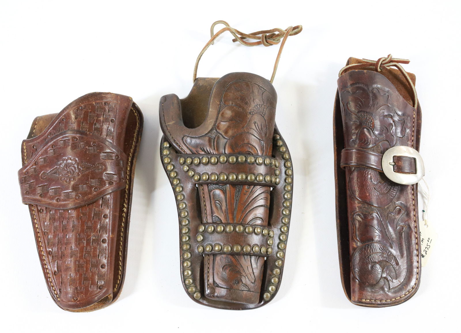 LOT OF (3) LEATHER HOLSTERS: EMBOSSED AND HAND TOOLED HOLSTER BY J.H. HART (10" L.) AND OTHERS. - PICK-UP FOR THIS AUCTION WILL BE ON MONDAY NOVEMBER 3RD, TUESDAY NOVEMBER 4TH, WEDNESDAY NOVEMBER 5TH, AND THURSDAY NOVEMBER 6TH FR