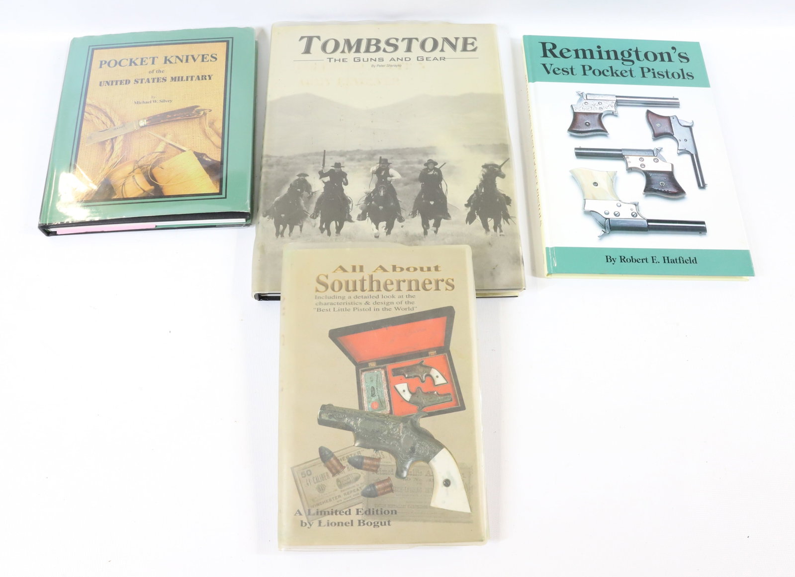 LOT OF KNIFE AND GUN REFERENCE BOOKS: INCLUDING: REMINGTON VEST POCKET PISTOLS, TOMBSTONE THE GUNS AND GEAR, POCKET KNIVES OF THE U.S. MILITARY AND ALL ABOUT SOUTHERNERS. - PICK-UP FOR THIS AUCTION WILL BE ON MONDAY NOVEMBER 3RD, TUESDAY 
