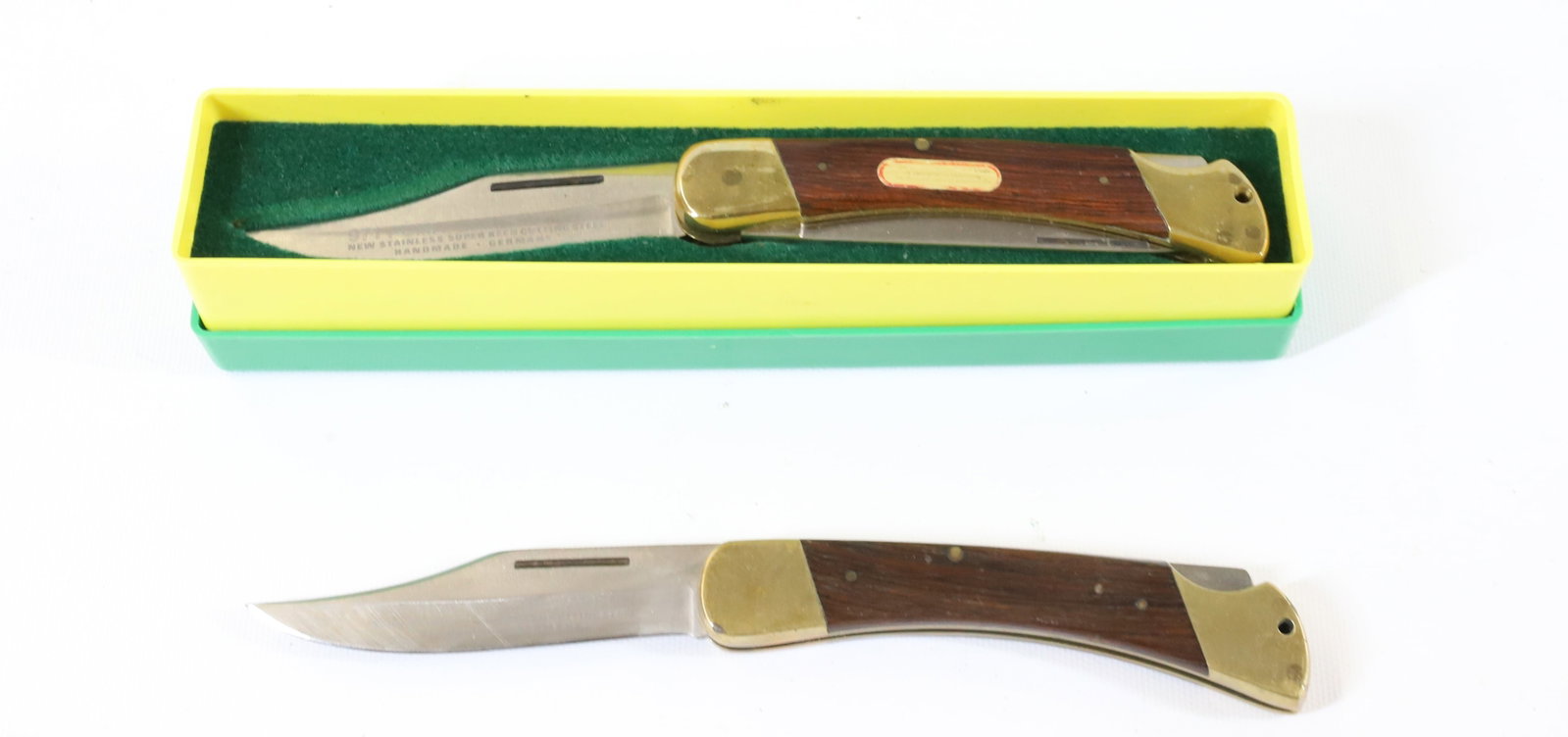 (2) PUMA 970 / 971 GAME WARDEN KNIVES: ONE NEW IN BOX. 9" TOTAL LENGTH. -PICK-UP FOR THIS AUCTION WILL BE ON MONDAY NOVEMBER 3RD, TUESDAY NOVEMBER 4TH, WEDNESDAY NOVEMBER 5TH, AND THURSDAY NOVEMBER 6TH FROM 9:00 AM TILL 3:00 PM. TO DO BACK