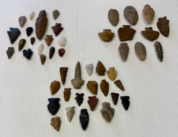 LOT OF (3) CASES OF CARVED STONE ARTIFACTS