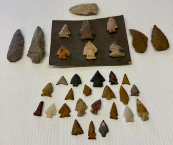 LOT OF (3) CASES OF CARVED STONE ARTIFACTS