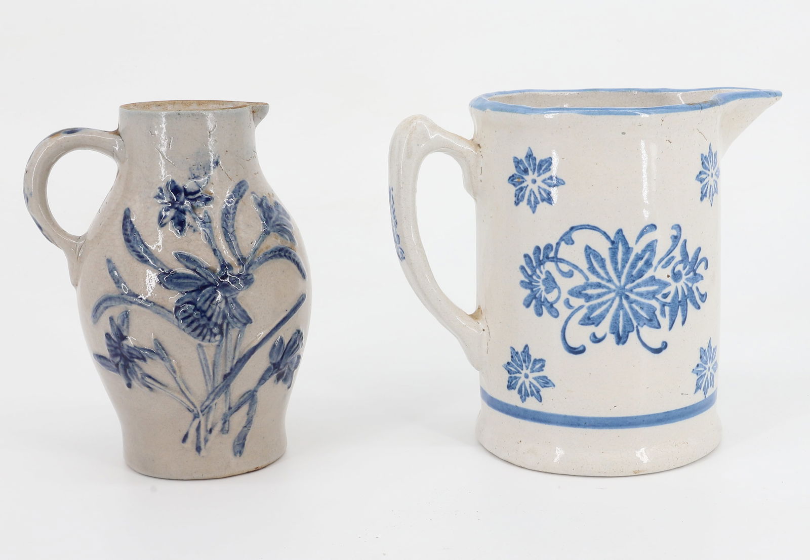 (2) DECORATED STONEWARE PITCHERS (1 of 6)