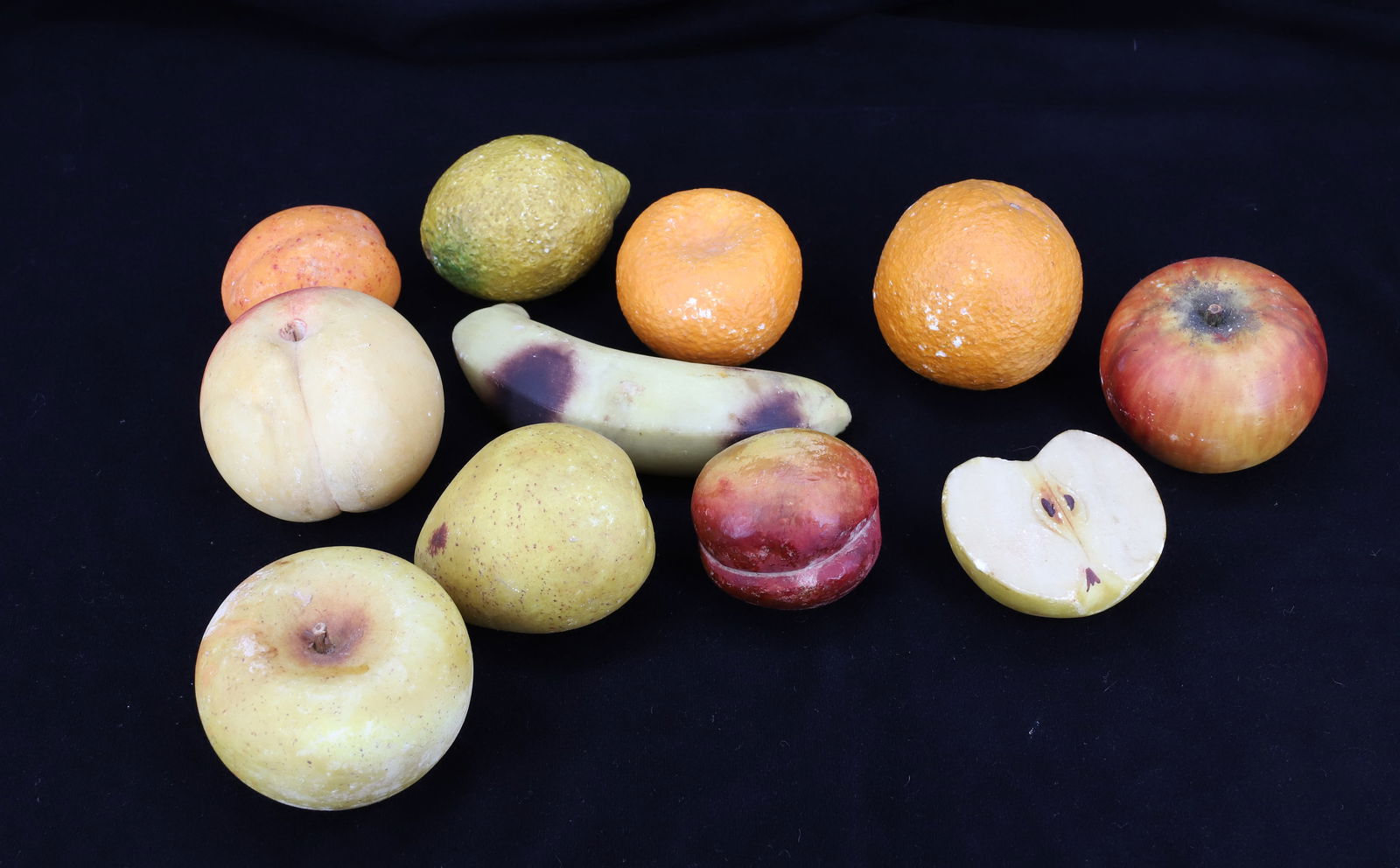 GROUP OF STONE FRUIT: (11) PIECES INCLUDING: HALF APPLE, ORANGES, LEMON, APPLES, BANANA AND MORE.