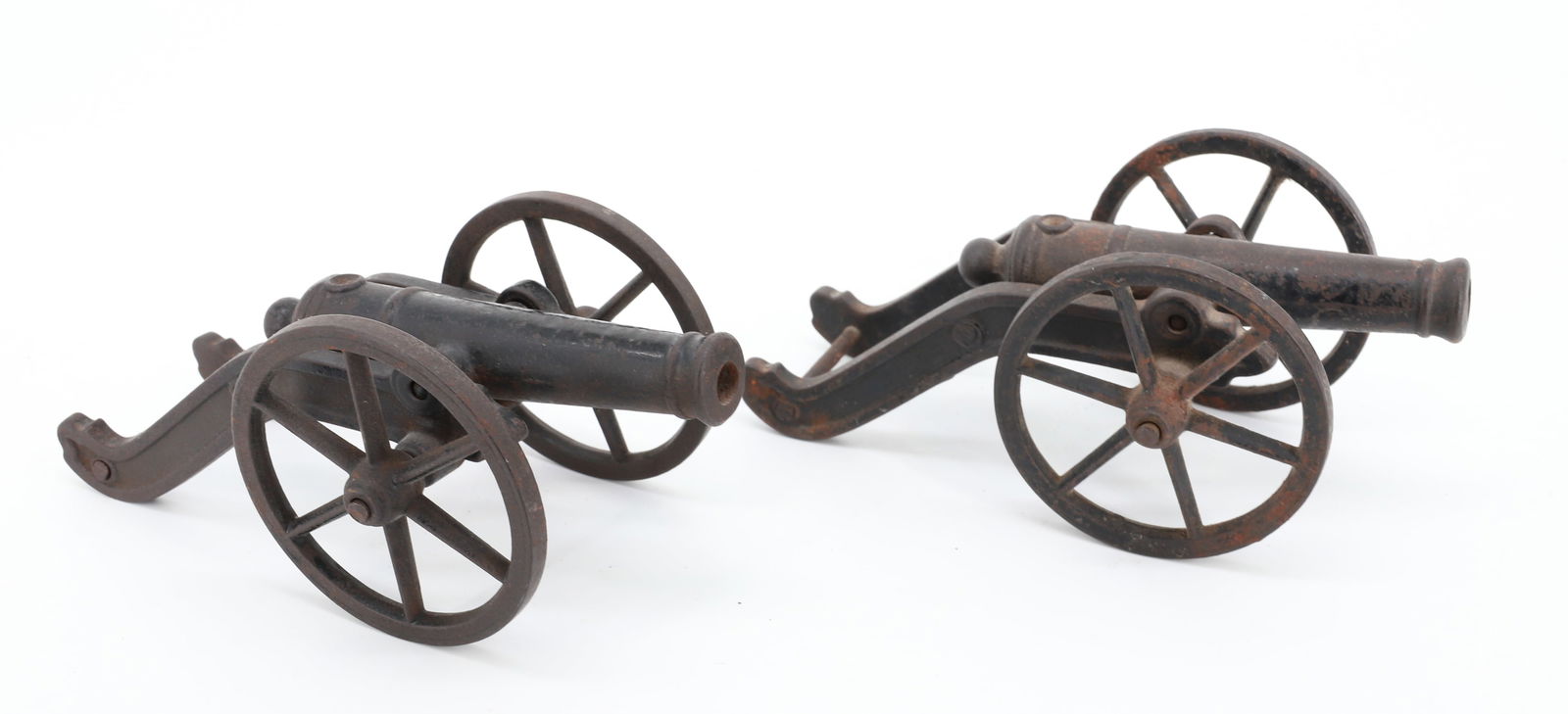 PAIR OF CAST IRON MINIATURE CANNONS (1 of 4)