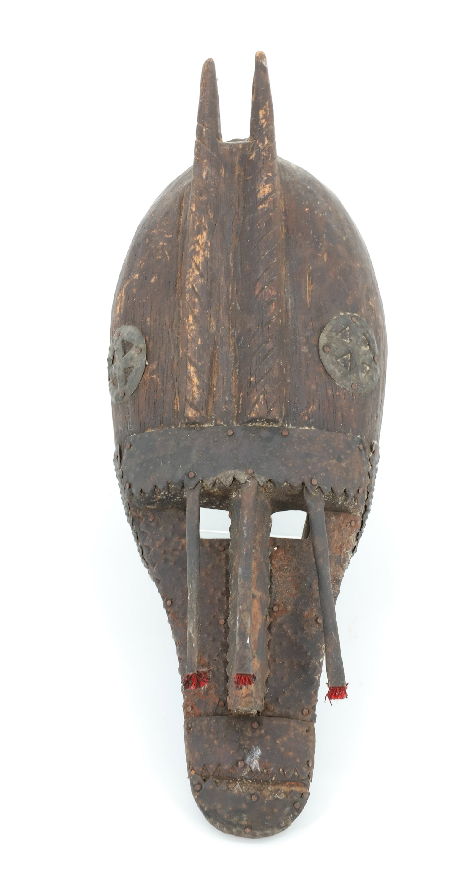 AFRICAN WOOD / METAL TRIBAL MASK: CARVED WOOD WITH APPLIED PUNCHED METAL WORK. BELIEVED TO BE MARKA MASK FROM MALI. 16" L.