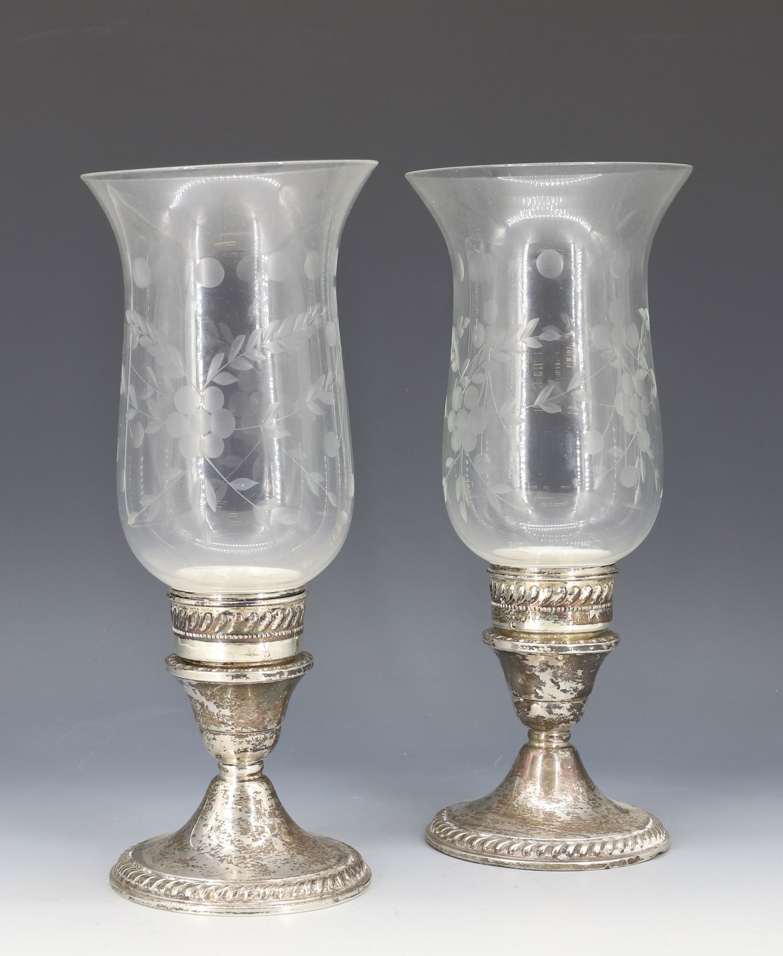 STERLING SILVER HURRICANE CANDLE HOLDERS: WEIGHTED STERLING WITH ENGRAVED SHADES 9 3/4" X 4" PLEASE READ CAREFULLY - Terms for Purchasing and Shipping of Auction Items. Please read carefully before bidding. Hartzell’s Auction Gallery. Hartz