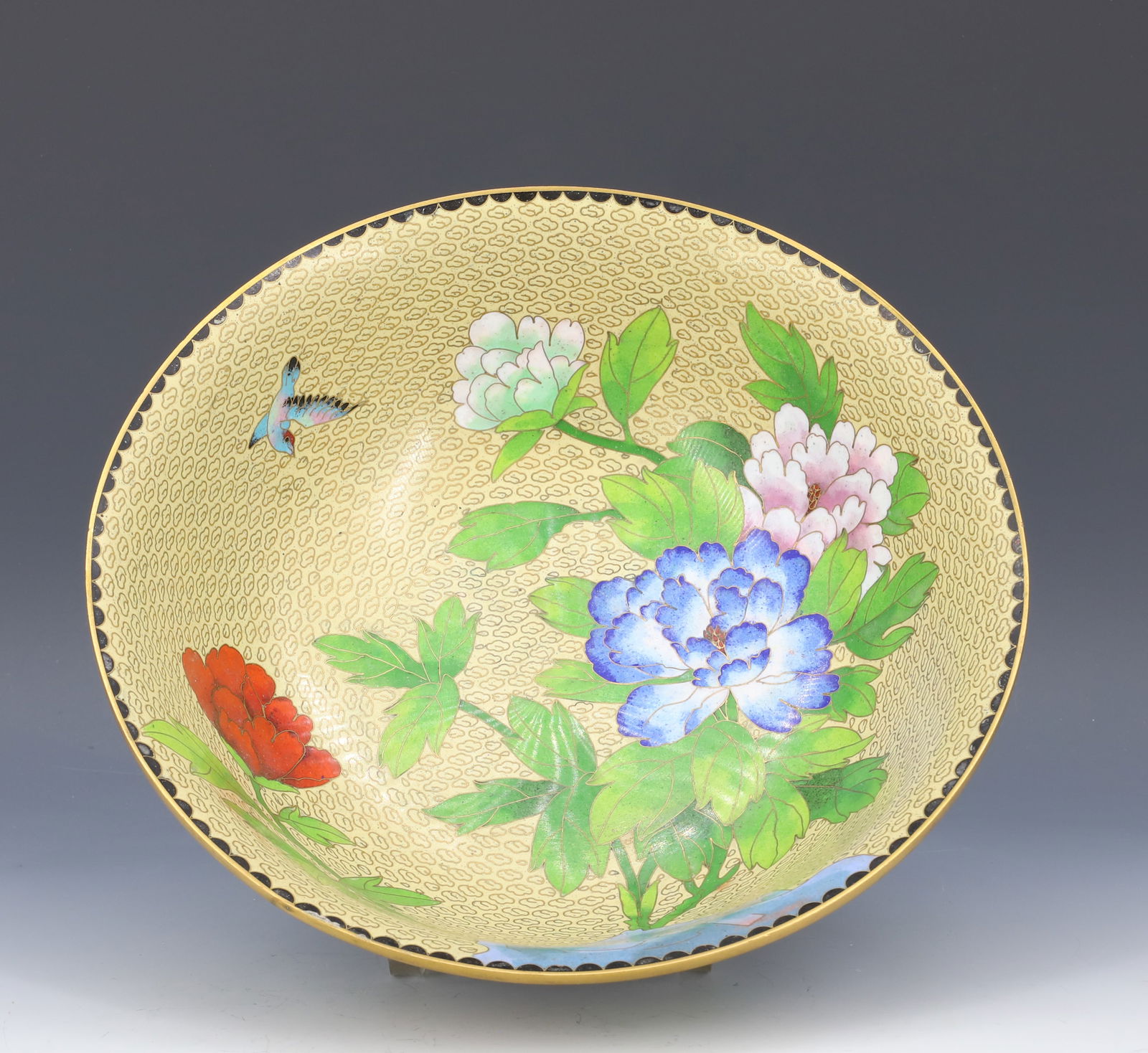 CHINESE CLOISONNE BOWL: TAN CLOUD BACKGROUND, WITH OPEN FLORAL BLOOMS AND BLUE BIRD 3 3/8" X 10" WITH ORIGINAL LABEL JINGFA PLEASE READ CAREFULLY - Terms for Purchasing and Shipping of Auction Items. Please read carefully be