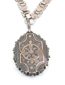 ANTIQUE BRITISH SILVER LOCKET