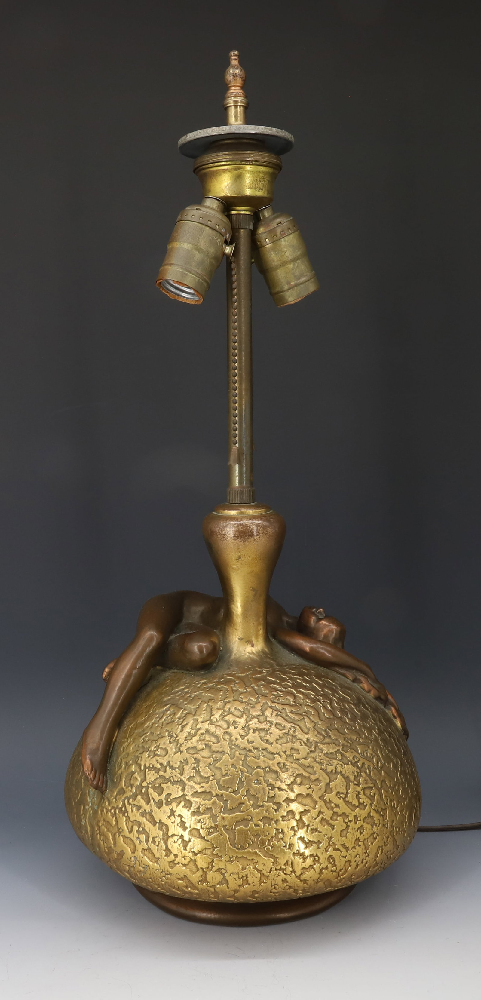 BRONZE OLIVE KOOKEN ART DECO NUDE LAMP: TEXTURED BRASS BODY WITH PATINATED BRONZE NUDE DRAPED OVER. OLIVE KOOKEN FEMALE ARTIST 1904-196421" X 9" DIA PLEASE READ CAREFULLY - Terms for Purchasing and Shipping of Auction Items. Please read car