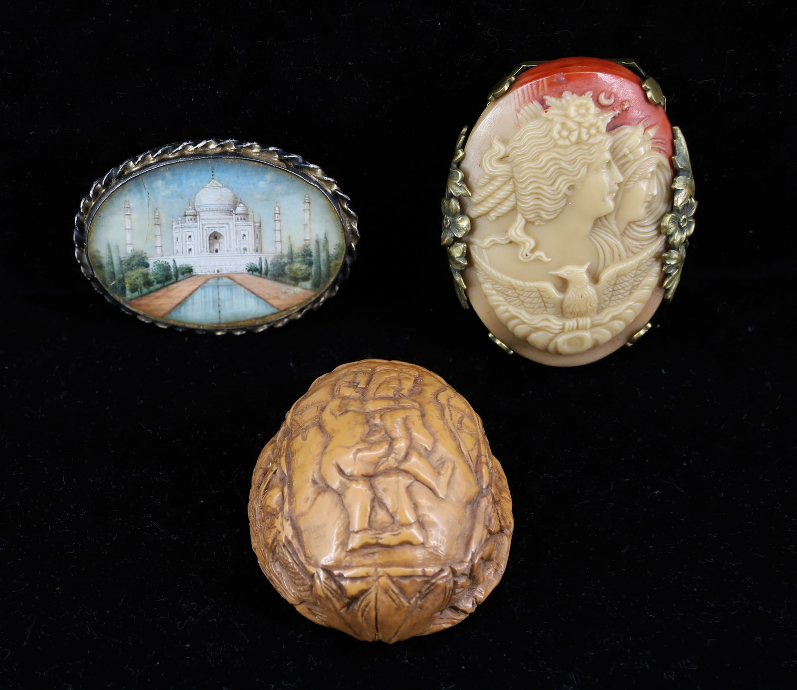 CARVED EROTIC NUT SHELL, (2) BROOCHES: ASIAN CARVED EROTIC WALNUT SHELL, PRESSED GLASS CAMEO ROMAN MOTIF, AND MINIATURE PAINTING TAJ MAHAL BROOCH IN SILVER VERMEIL SETTING 1 3/4" X 1 1/2" PLEASE READ CAREFULLY - Terms for Purchasing and Sh