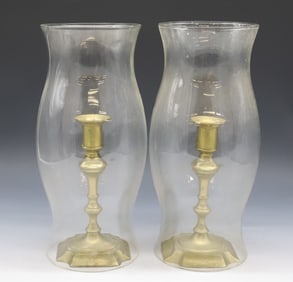 EARLY BRASS BRITISH CANDLESTICKS AND HURRICANE SHADES