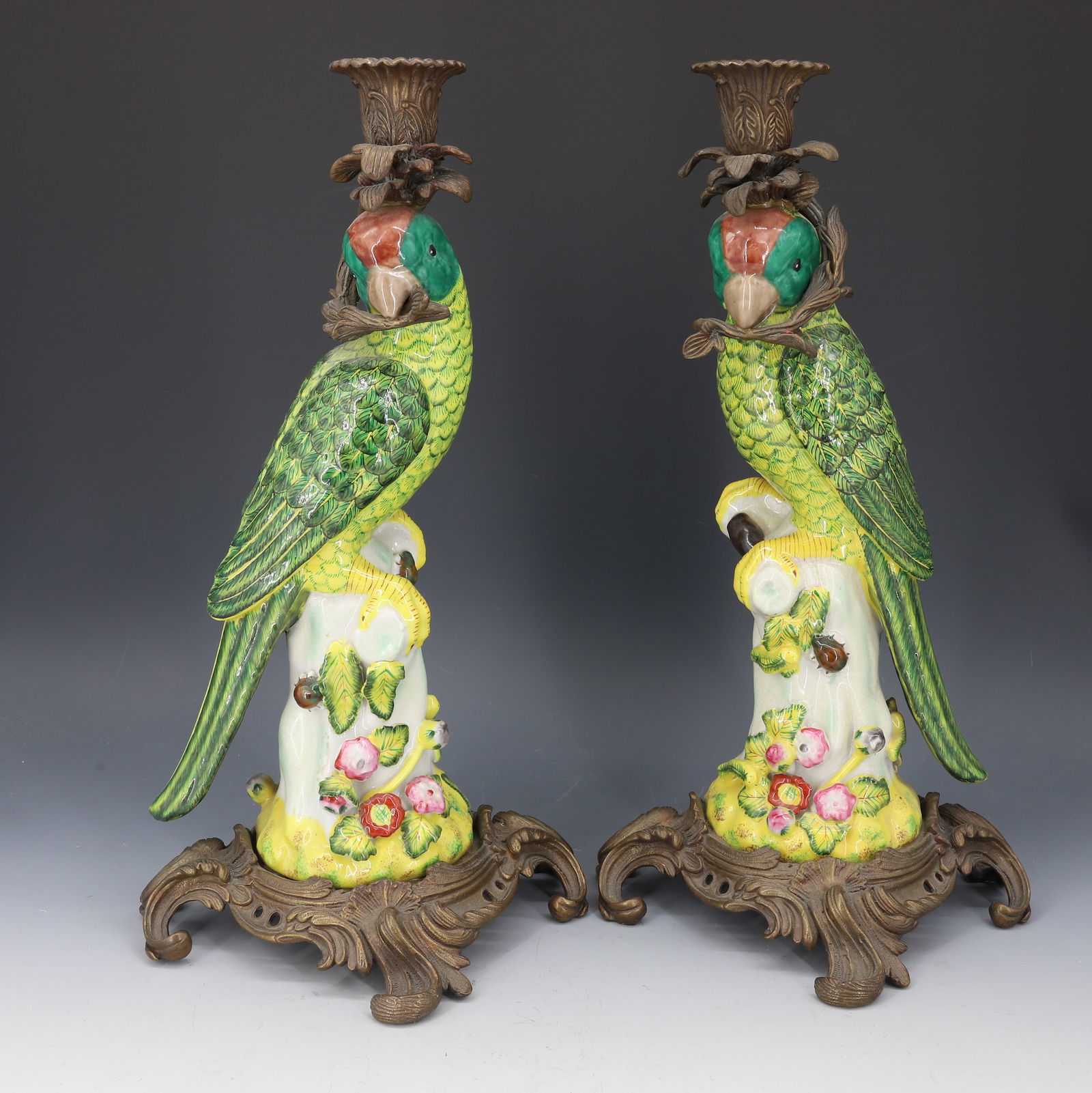 PAIR OF CHINESE CANDLESTICKS FAIENCE PARROTS IN BRASS MOUNTS: CONTEMPORARY HAND PAINTED DETAILED BRASS CASTING 14 1/2" PLEASE READ CAREFULLY - Terms for Purchasing and Shipping of Auction Items. Please read carefully before bidding. Hartzell’s Auction Gallery.