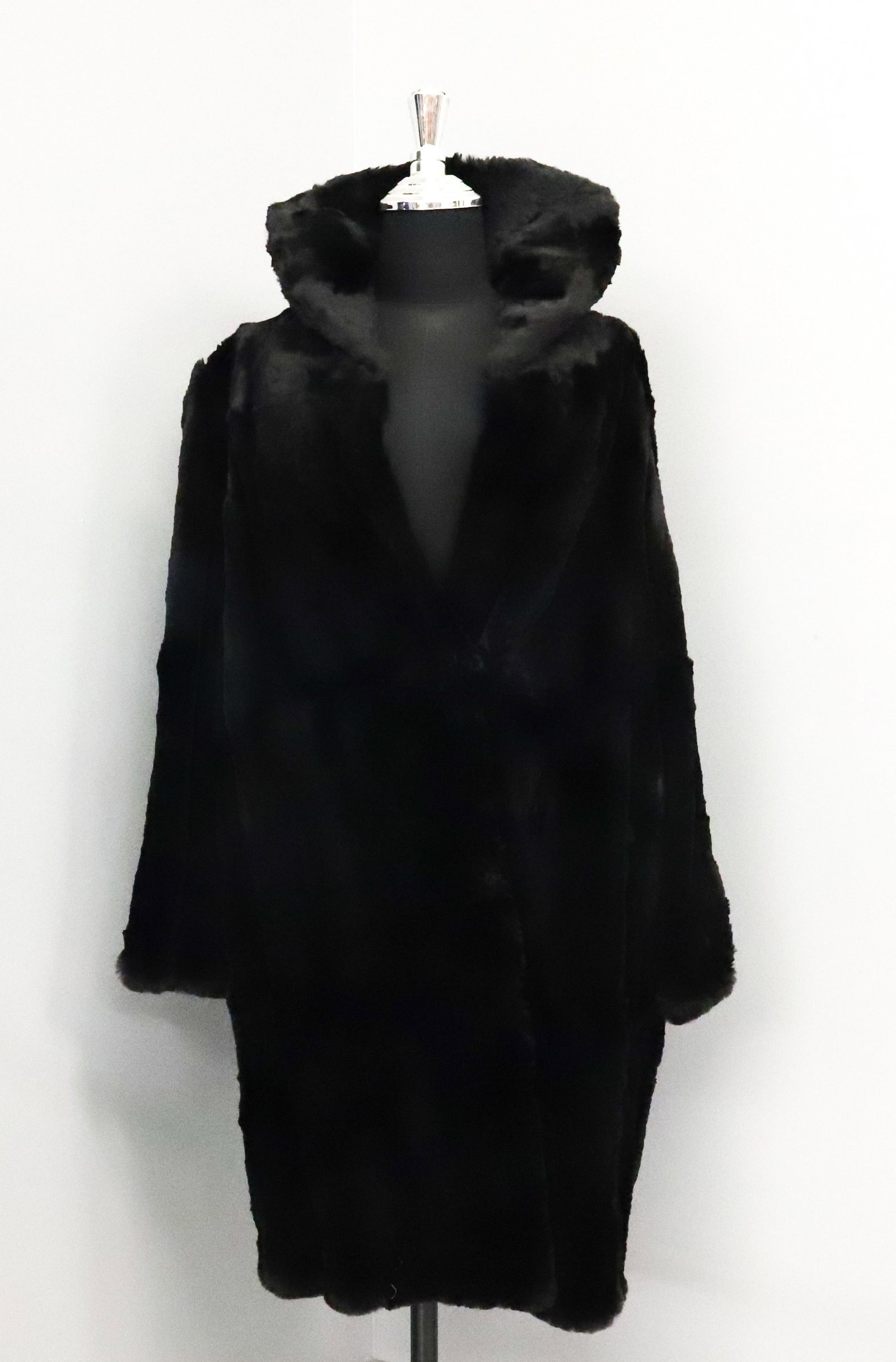 LADIES FUR COAT BLACK: 20"H X 36" PLEASE READ CAREFULLY - Terms for Purchasing and Shipping of Auction Items. Please read carefully before bidding. Hartzell’s Auction Gallery. Hartzell's Auction Gallery will handle shippi