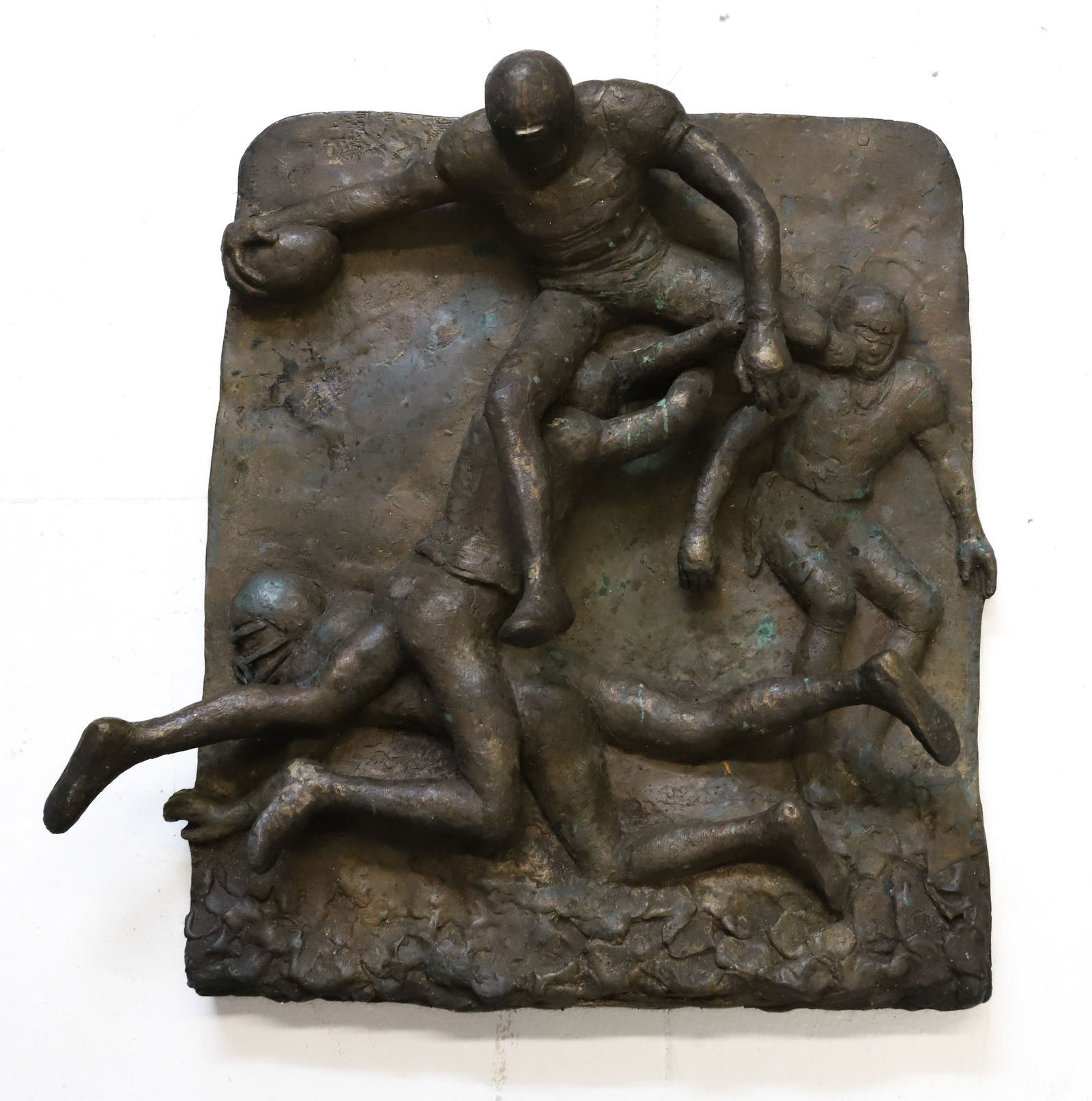 BRONZE WALL PLAQUE FOOTBALL PLAYERS: (4) FOOTBALL PLAYERS WITH FOOTBALL MID CENTURY MODERN 15 1/5" X 12 1/2" PLEASE READ CAREFULLY - Terms for Purchasing and Shipping of Auction Items. Please read carefully before bidding. Hartzell’s A