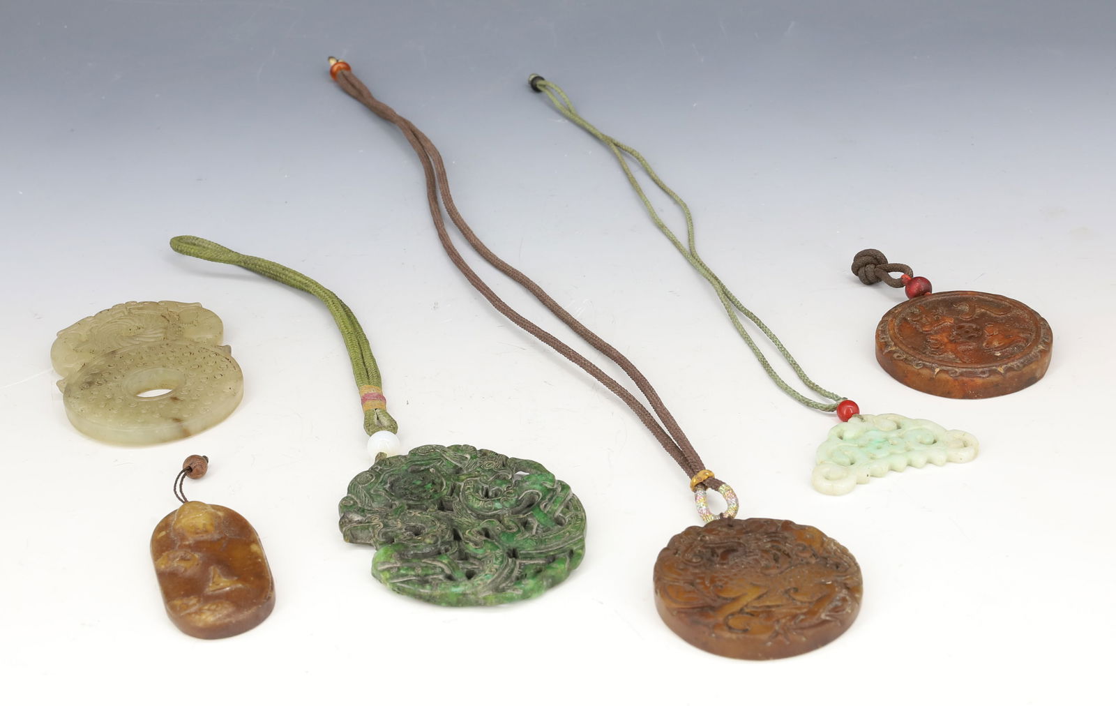 CHINESE CARVED HARDSTONE AND JADEITE PENDANTS (1 of 5)