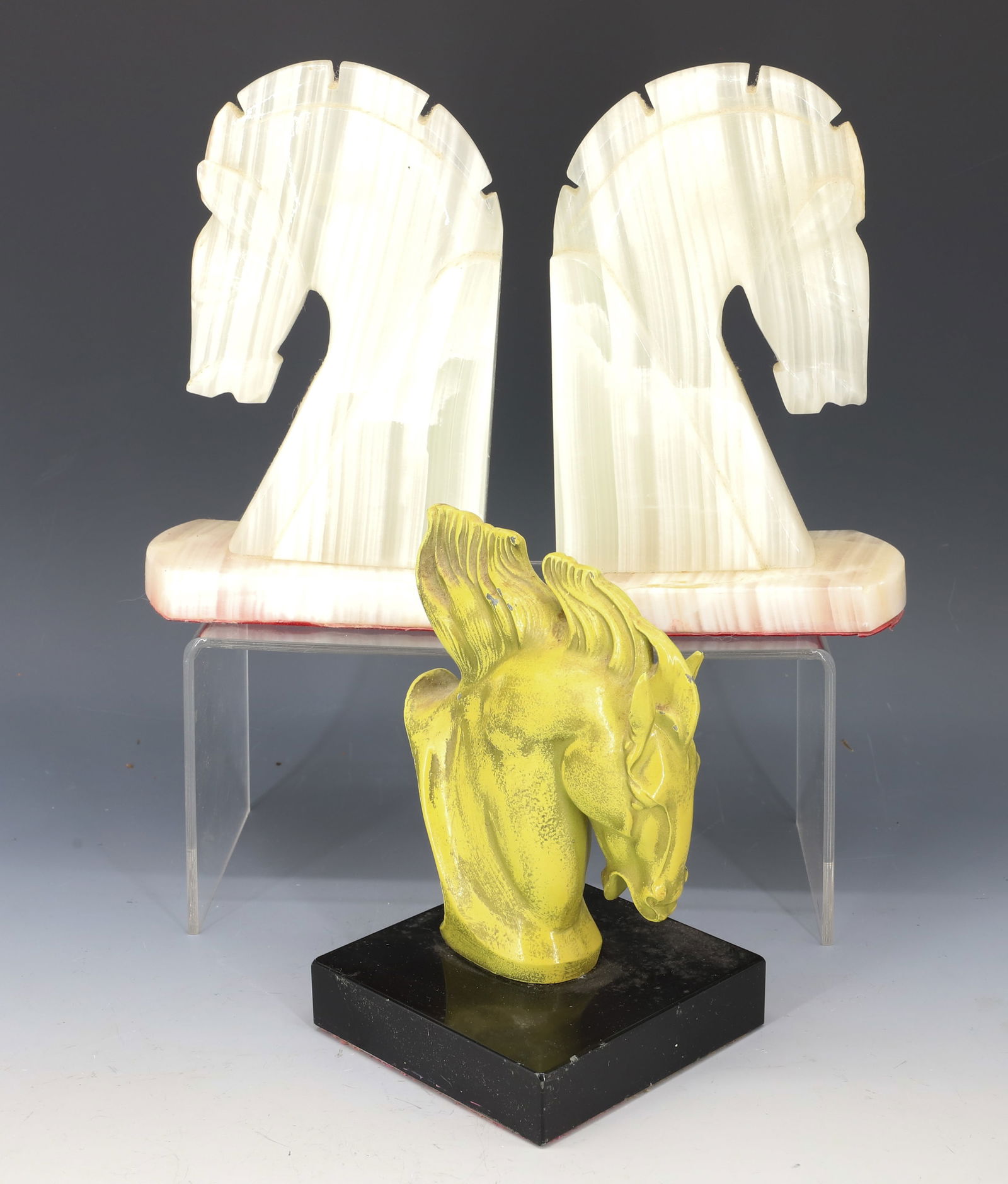 (2) PAIRS OF HORSE BOOKENDS, ONYX AND METAL: ONYX BOOKENDS 7 1/4"H, METAL HORSE BOOKENDS 6"H PLEASE READ CAREFULLY - Terms for Purchasing and Shipping of Auction Items. Please read carefully before bidding. Hartzell’s Auction Gallery. Hartzell