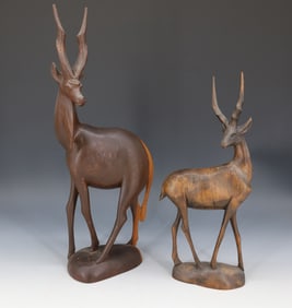 (2) AFRICAN CARVED WOOD GIRAFFE AND CARABAO