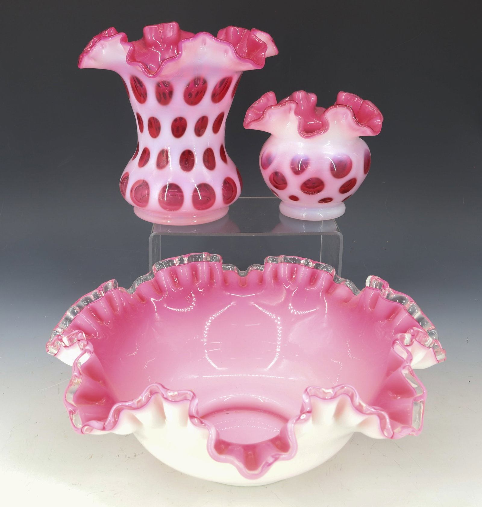 (3) FENTON CASED CRANBERRY ITEMS: (2) RUFFLE TOP CASED COINSPOT, RUFFLE TOP CASE BOWL WITH CLEAR RIM 4"H,6"H, 4" X 10" PLEASE READ CAREFULLY - Terms for Purchasing and Shipping of Auction Items. Please read carefully before bidding. H