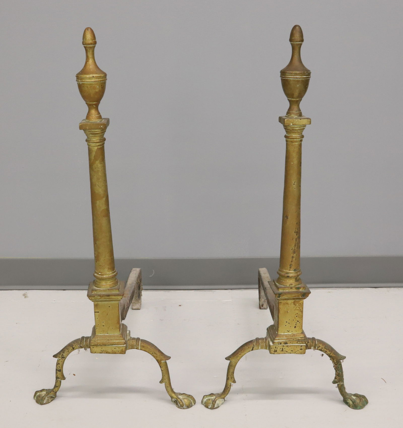 AMERICAN FEDERAL TALL ANDIRONS: BALL AND CLAW FOOT TALL STANDARD WITH URN FINIALS 29 1/2"H X 20" X 13"W PLEASE READ CAREFULLY - Terms for Purchasing and Shipping of Auction Items. Please read carefully before bidding. Hartzell’s A