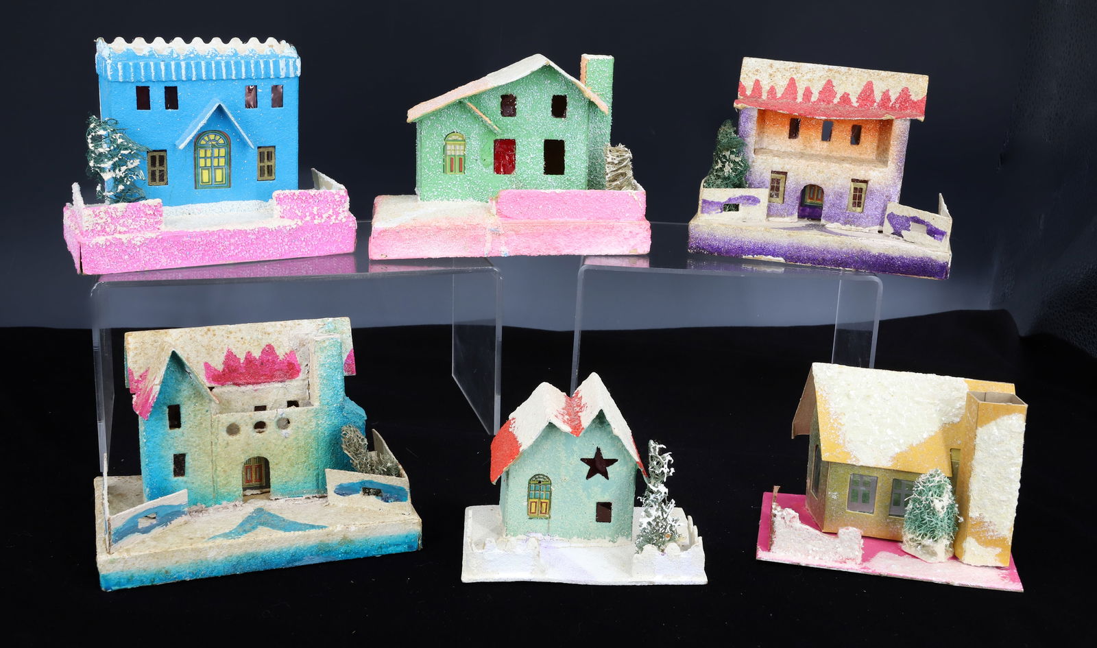 LOT OF (6) PUTZ CHRISTMAS HOUSES: SEVERAL STAMPED "MADE IN JAPAN", ONE "MADE IN USA" (HOUSE DETACHED FROM BASE). LARGEST 6" X 4" H. PLEASE READ CAREFULLY - THIS IS AN ONLINE ONLY AUCTION -Terms for Purchasing and Shipping of Auction I