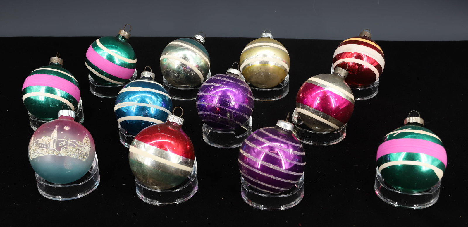LOT OF SHINY BRITE GLASS CHRISTMAS ORNAMENTS: (12) BALL ORNAMENTS. MOST WITH STRIPES. 2 3/8" D. PLEASE READ CAREFULLY - THIS IS AN ONLINE ONLY AUCTION -Terms for Purchasing and Shipping of Auction Items. Please read carefully before bidding. Hart