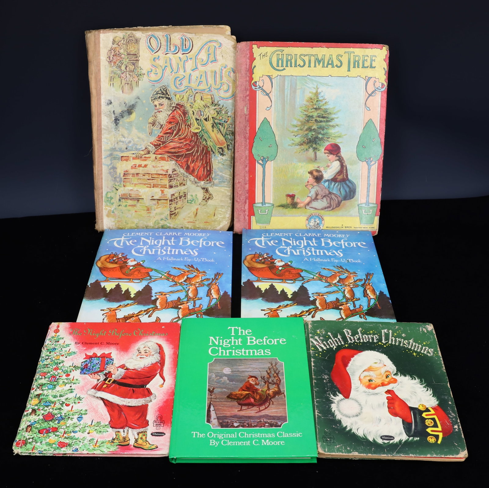 LOT OF VINTAGE CHRISTMAS BOOKS: "OLD SANTA CLAUS", "THE CHRISTMAS TREE" (HANS CHRISTIAN ANDERSEN), SEVERAL VERSIONS OF "NIGHT BEFORE CHRISTMAS". PLEASE READ CAREFULLY - THIS IS AN ONLINE ONLY AUCTION -Terms for Purchasing and Shippi